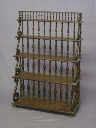 A Regency style 5 tier rectangular bookcase with bobbin turned decoration 32"