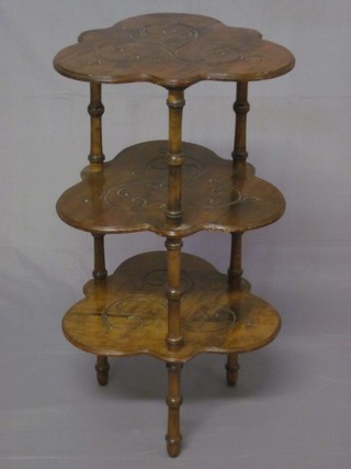 A Victorian circular carved walnut 3 tier what-not 16"