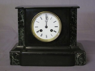 A Victorian French 8 day striking mantel clock contained in a 2  colour marble case with enamelled dial and Arabic numerals 11"