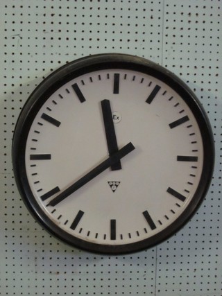 An electric wall clock, the dial marked EX 18"
