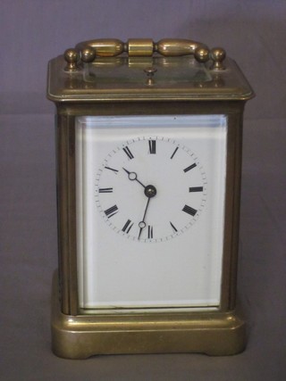 A 19th Century repeating carriage clock with enamelled dial and Roman numerals by Japy Freres ILLUSTRATED