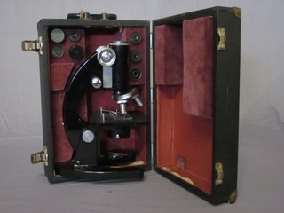 A G Baker single pillar microscope no. 37739, cased and  complete with lenses
