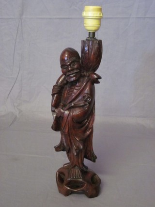 An Oriental carved fruit wood figure table lamp 15"
