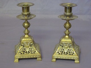 A pair of Victorian pierced brass candlesticks 8"
