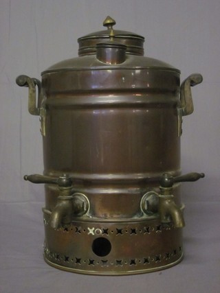 An oval copper twin handled and twin spouted tea urn