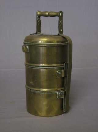 An Eastern cylindrical 3 section brass food carrier 9"
