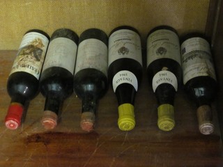 A half bottle of 1955 Chateau Junayme Cotes-Canon-Fronsac, 2 half bottles of 1961 St Emillion shipped and bottled by the  Private Wine Buyer's Society, 2 half bottles of 1964 Grand  Pouilly Chardonnay and a half bottle of Chateau De Terrefort  Quancard