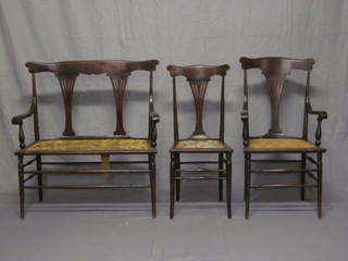 An Edwardian 7 piece drawing room suite comprising double  chair back settee, pair of armchairs and 4 dining chairs