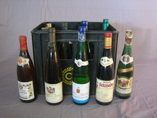 A plastic crate containing 2 bottles of 1970 Pies Porter Michelsberg, 1 bottle of 1974 Niersteiner, 3 bottles of 1981  Dopff & Iron Geuvurztramiser and 6 other bottles of white wine