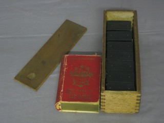 A Waddington's Lexican card game and a set of dominoes