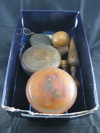 A circular turned wooden bowl and cover 3 1/2", a cylindrical jar  and cover 3", a wooden plumb bob and other curios