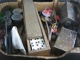 A cardboard box containing a pair of wax trimming scissors, set of dominoes, a telescopic sight, various curios etc