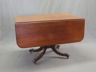 A Georgian mahogany pedestal drop flap Pembroke table fitted a drawer 42"