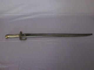 A chassepot bayonet with un-engraved blade complete with  metal scabbard ILLUSTRATED