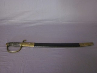 A 19th Century Bandsman type sword with 32" curved blade, the  gilt guard marked Parker Enfield & Sons London, complete with  leather scabbard ILLUSTRATED