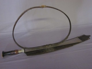 A Tibetan Kachin sword-dao with 20" blade and wooden grip, complete with carrier ILLUSTRATED