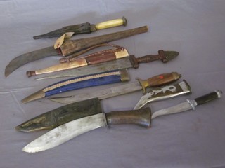 A Ugandan vegetable pruning knife and 5 various daggers