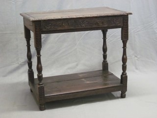 A 17th/18th Century carved oak side table fitted a drawer and raised on turned and block supports 33"