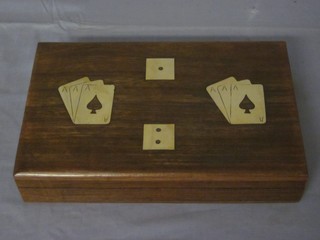 2 sets of playing cards and 5 hardwood and brass inlaid dice  contained in a wooden box with hinged lid