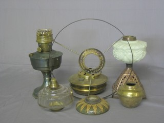 A collection of oil lamps bases etc