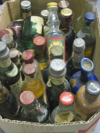 A collection of various miniature bottles of spirits