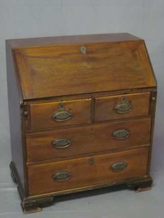 A Georgian mahogany bureau with fall front revealing a well  fitted interior above 2 short and 2 long drawers, raised on ogee  bracket feet 34"