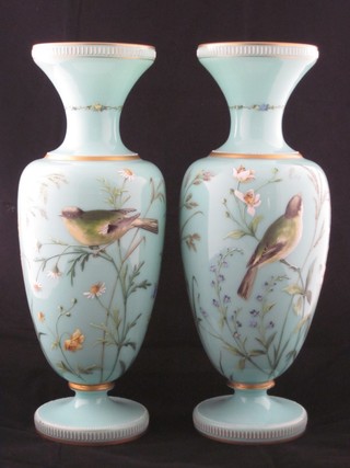 A handsome matched pair of Victorian opaque turquoise glass  club shaped vases decorated birds 15 1/2" high