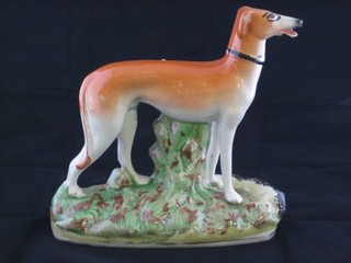 A 19th Century Staffordshire figure of a standing grey hound 6"