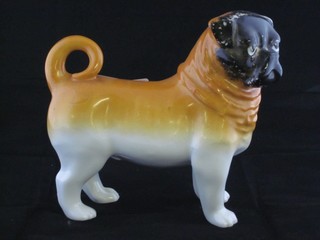 A 19th Century porcelain figure of a standing Pug, 6"