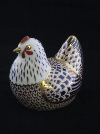 A Royal Crown Staffordshire figure of a seated hen, base marked  L111 3"