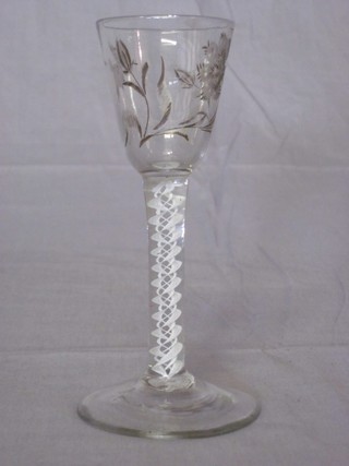 An 18th Century ale glass with cotton twist stem, raised on a circular spreading foot 6"