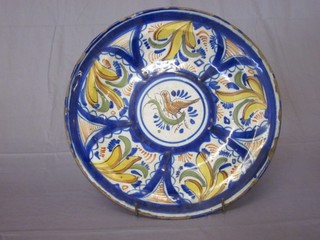 An 18th/19th Century circular Delft plate, the reverse marked  EAF 12"