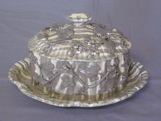 A 19th Century oval grey glazed butter dish and cover 7"