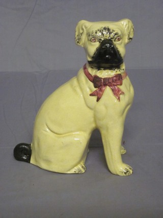 A 19th Century pottery figure of a seated Pug 8"