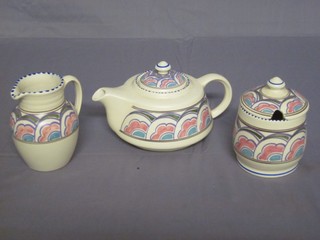 A Honiton teapot the base marked S5876 4 1/2", do. preserve jar 3" and a do. jug 4"