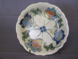 A circular Honiton bowl with floral decoration 8"