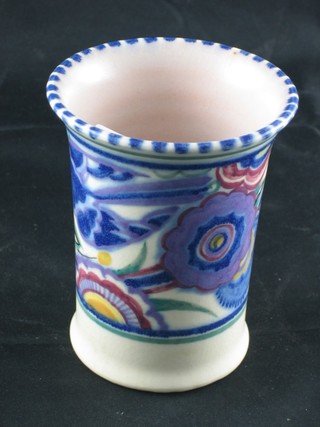 A cylindrical Poole Pottery vase with floral decoration, the base impressed Poole England and incised 117PB 3 1/2"