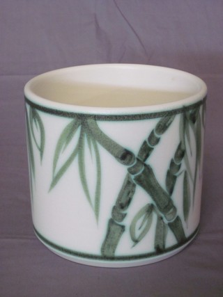 A circular Poole Pottery jardiniere decorated bamboo, the base  with dolphin mark 5"