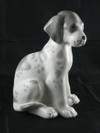 A Soviet Russian porcelain figure of a seated dog 7"