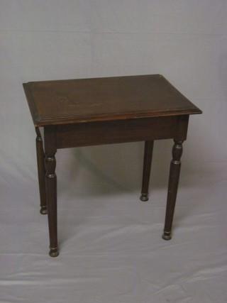 A 19th Century rectangular mahogany side table, raised on turned supports 26"