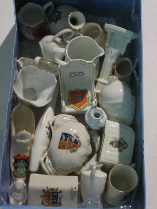 3 shallow boxes containing a collection of crested china