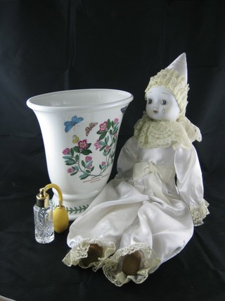 A Port Meirion boat shaped vase 8", a perfume atomiser, a porcelain doll and a pair of plaster figures