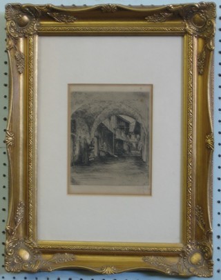 A 19th Century etching "Courtyard" 6" x 5" contained in a decorative gilt frame