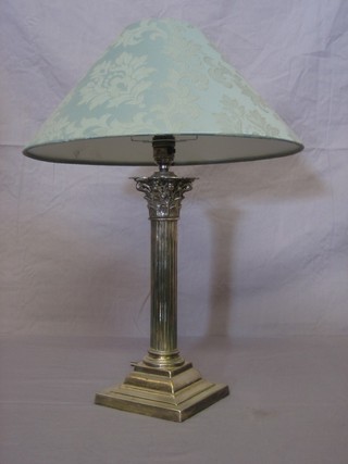 A silver plated reeded table lamp with Corinthian capital 12"