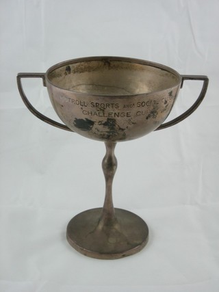 A silver twin handled trophy cup, Birmingham 1929 10 ozs