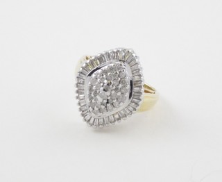 A lady's 18ct gold marquise shaped dress ring set numerous diamonds