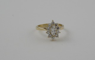 A lady's 18ct yellow gold marquise shaped cluster dress ring set numerous diamonds