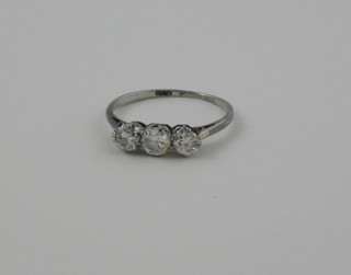 A lady's platinum dress ring set 3 diamonds