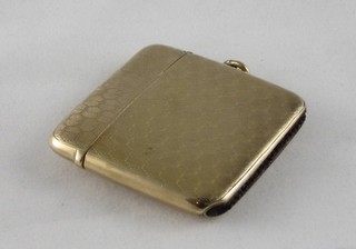 A 9ct gold vesta case with engine turned decoration 24gms ILLUSTRATED