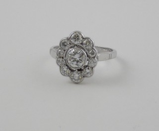 A lady's 18ct white gold cluster dress/engagement ring set  diamonds, approx 1.40ct 